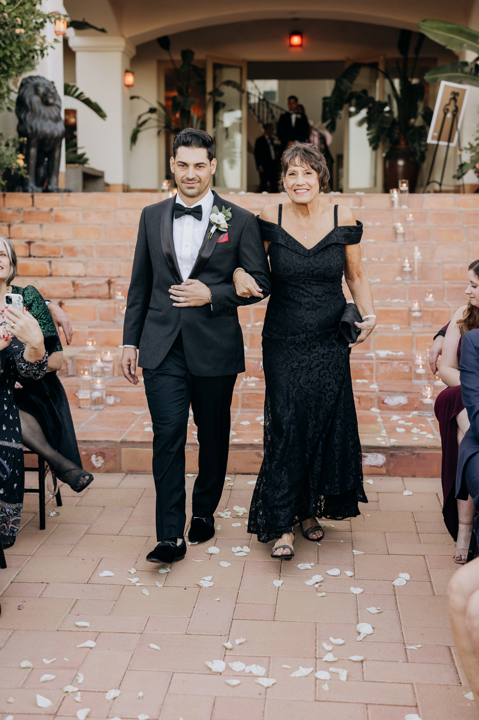 groom walking down isle
