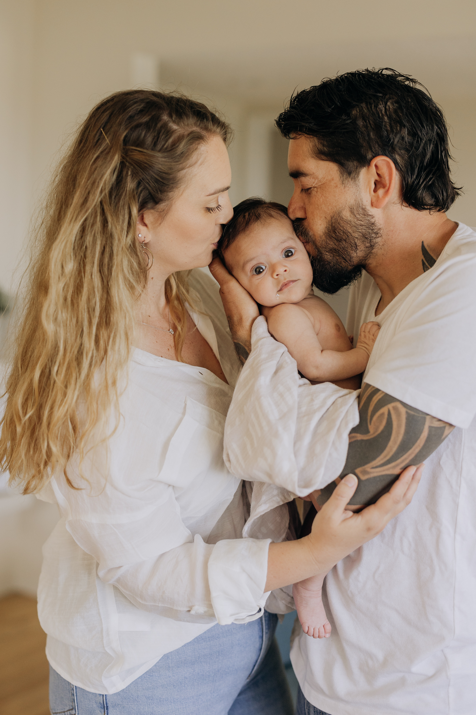 Parents and newborn baby photos