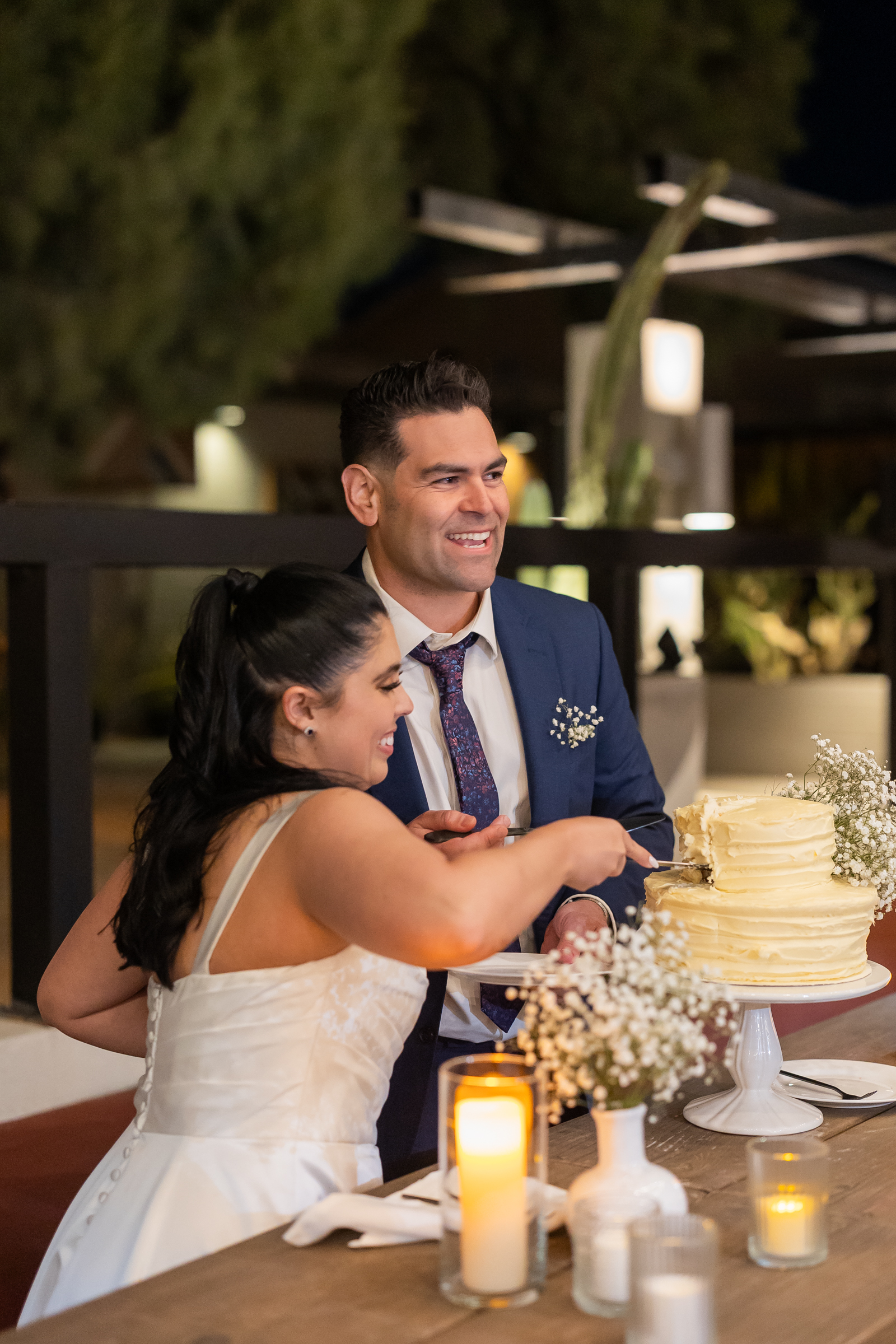 Cake cutting bride and groom