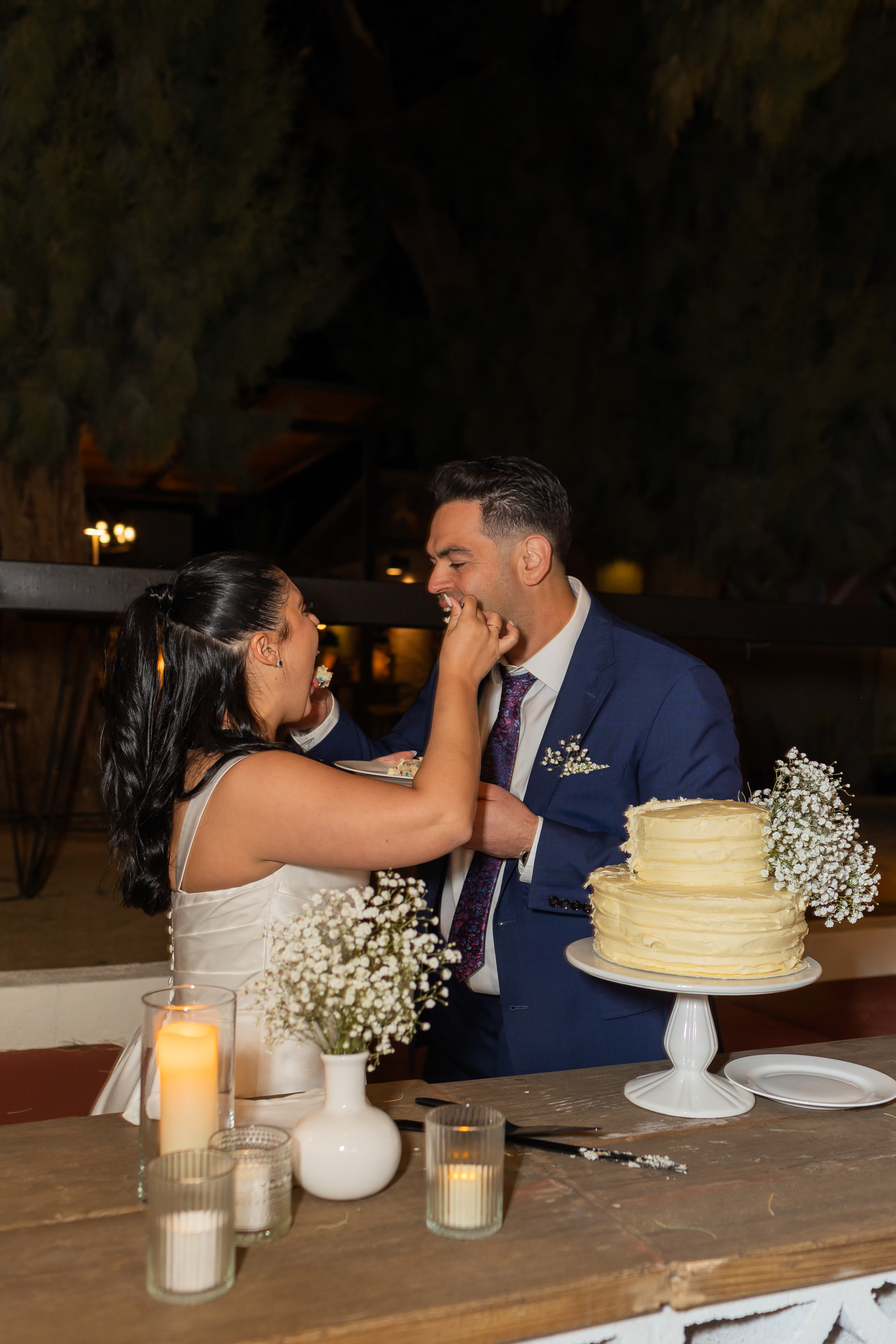 Cake cutting bride and groom