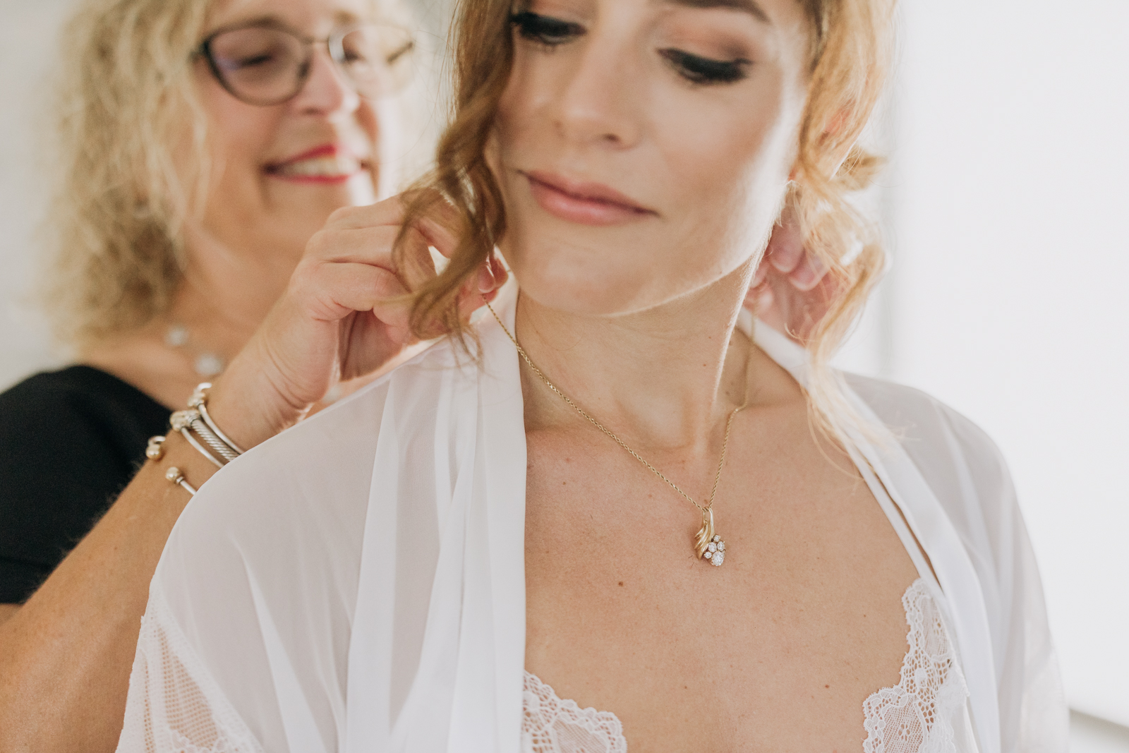Mother and bride getting ready